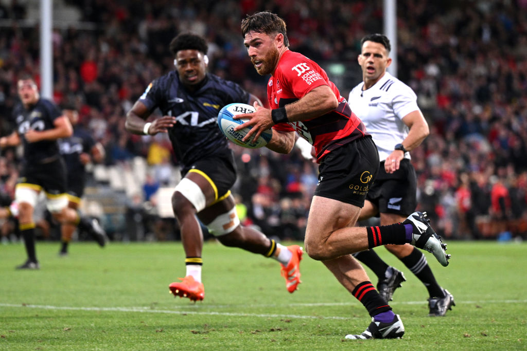 Kyle Preston makes a break for the Crusaders against the Hurricanes. Photo: Getty