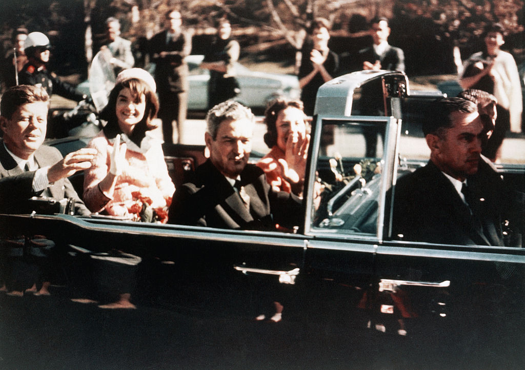 Prior to the assassination, President John F Kennedy (left) and First Lady Jacqueline Kennedy...