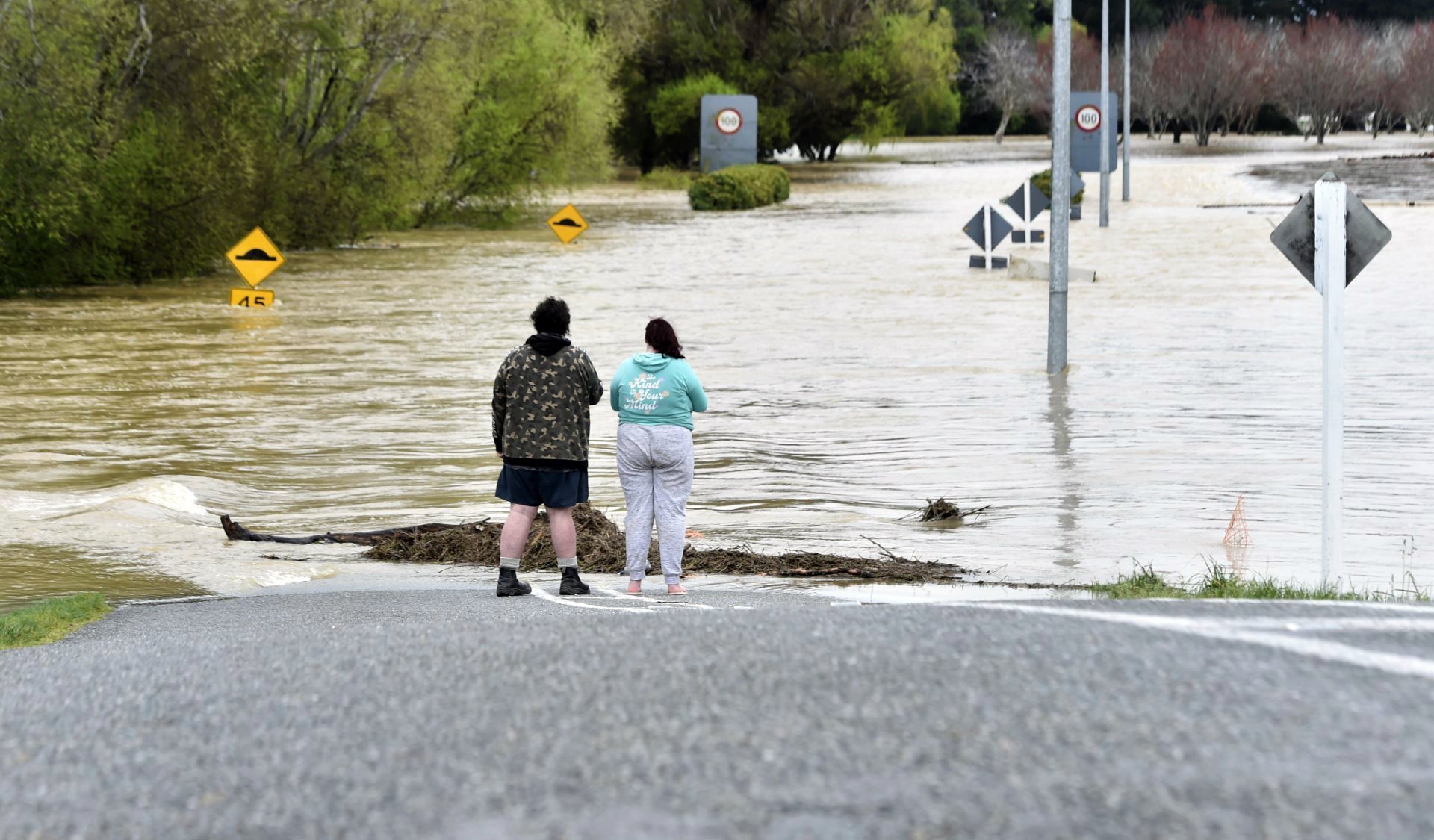 Richard Win (left) and Antonia Davis at Woolwich St in Gore, after the Mataura River flooded in...