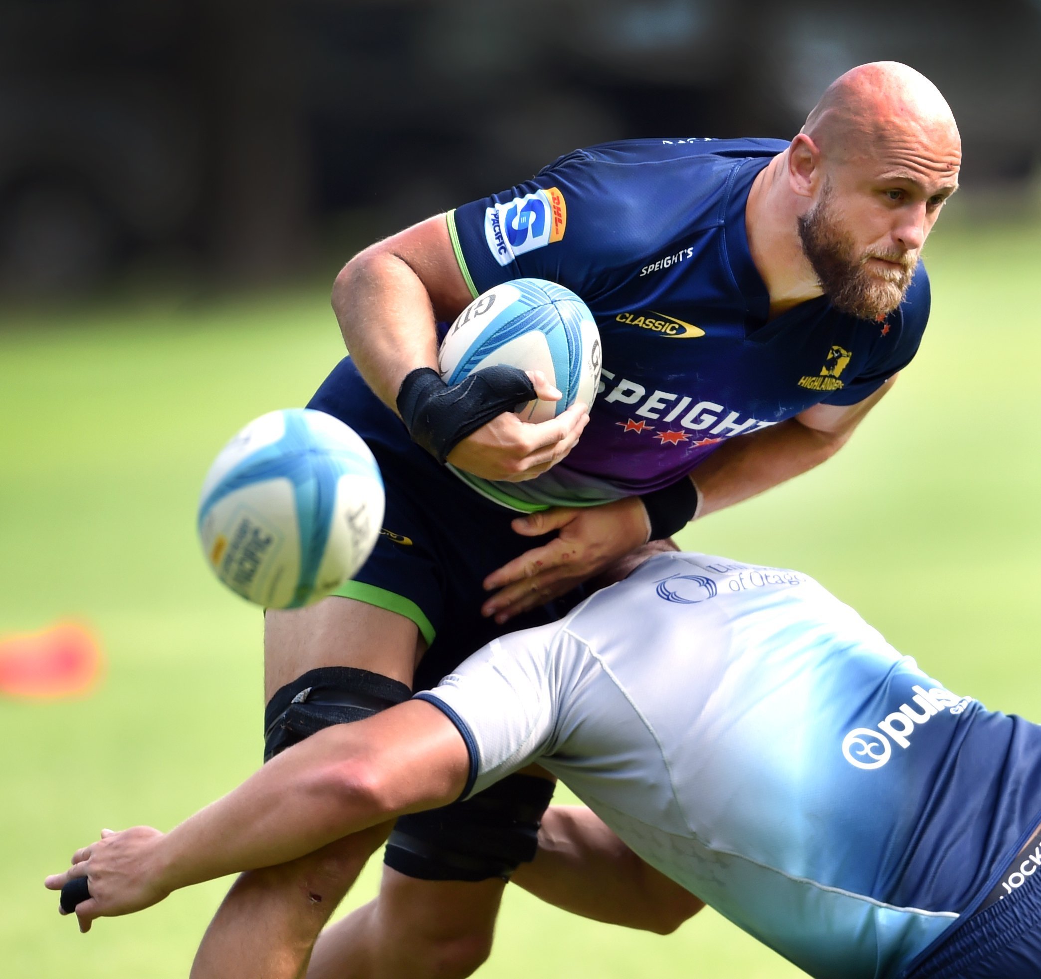 Highlanders co-captain Hugh Renton blasts into a team-mate at a training session. PHOTO: PETER...