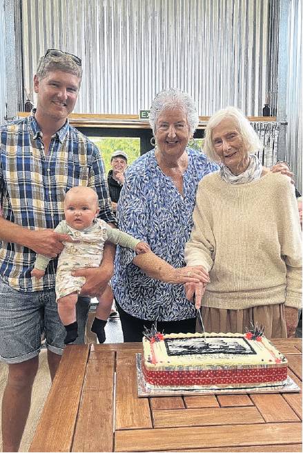 The 150th cake was cut by Marion (Dalley) Spiller as the oldest family member, Cavel Dalley as...