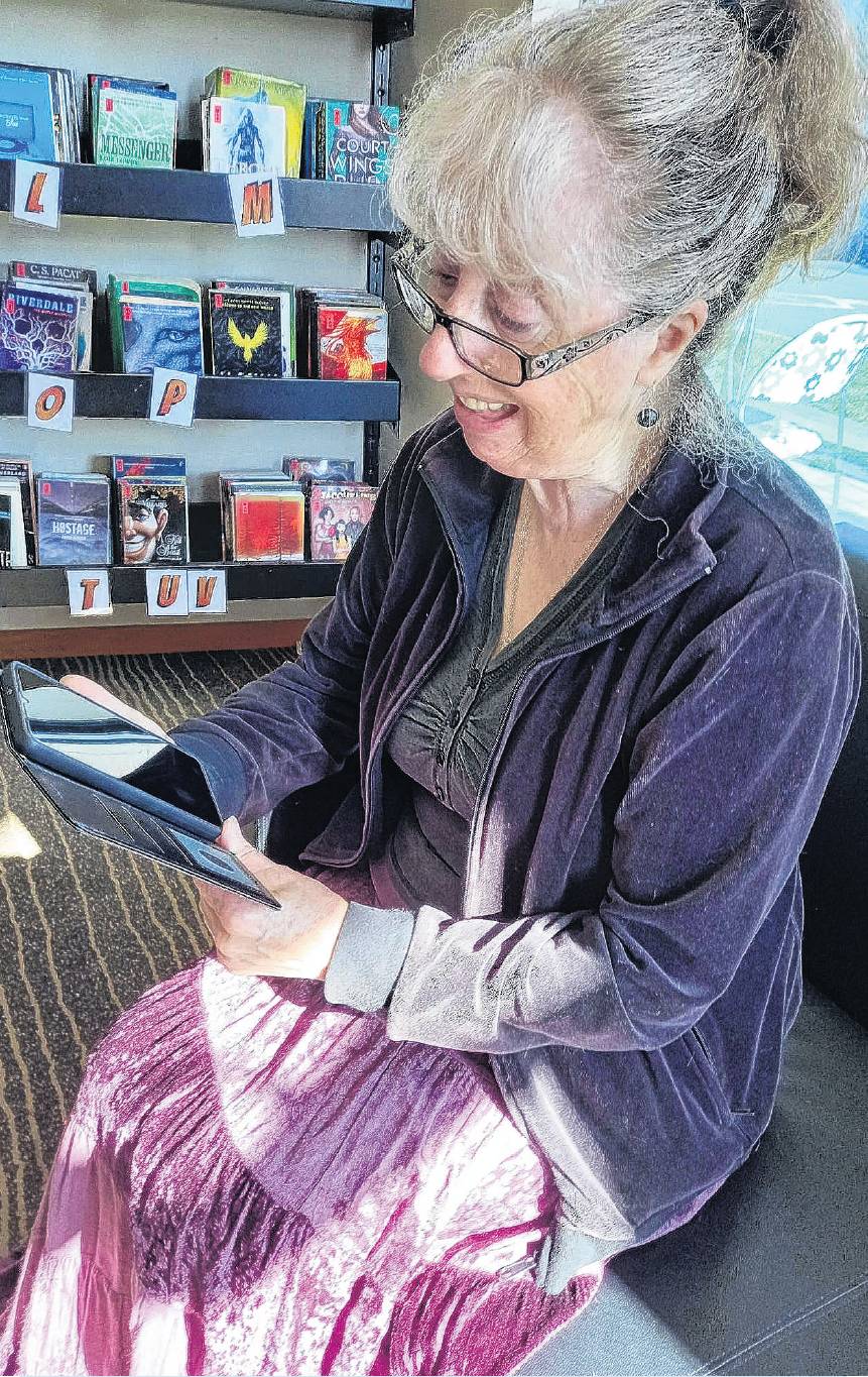 Glynis Hore gets some tailored advice at a Hurunui Libraries device advice session. PHOTO: SUPPLIED