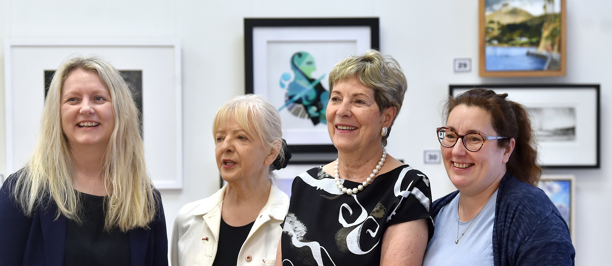 At the "An Artistic View: From Dunedin With Love" exhibition on Friday are (from left) Tania...