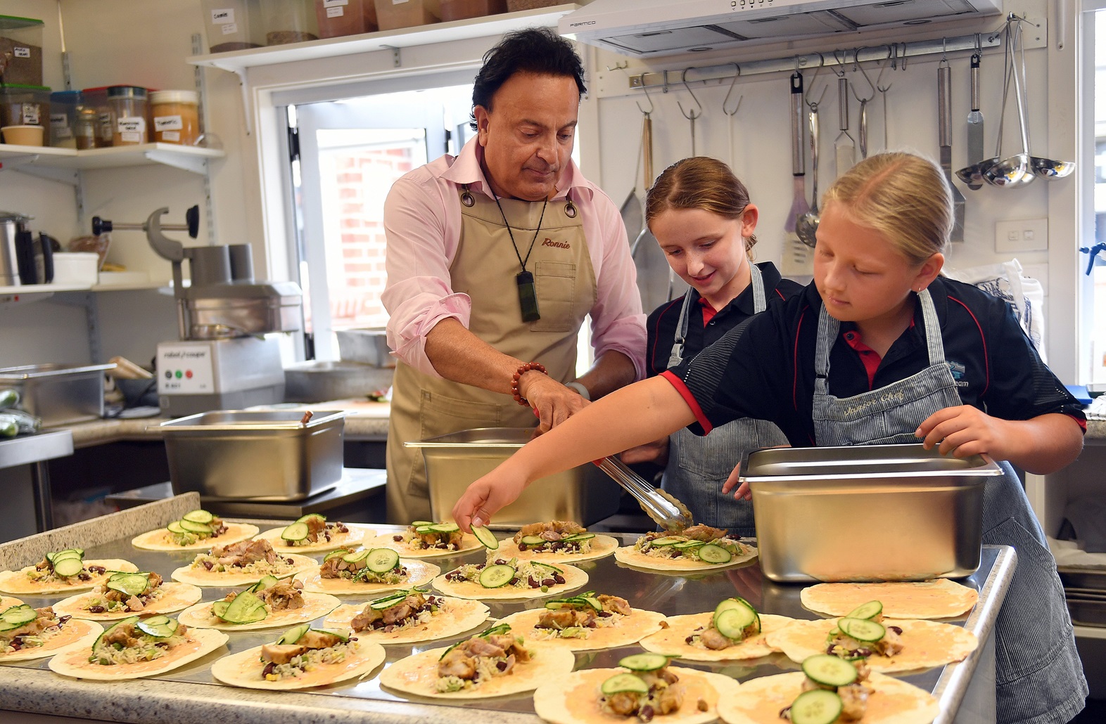 Making lunches for Silverstream School in Mosgiel yesterday are (from left) chef Ronnie Bhogal...