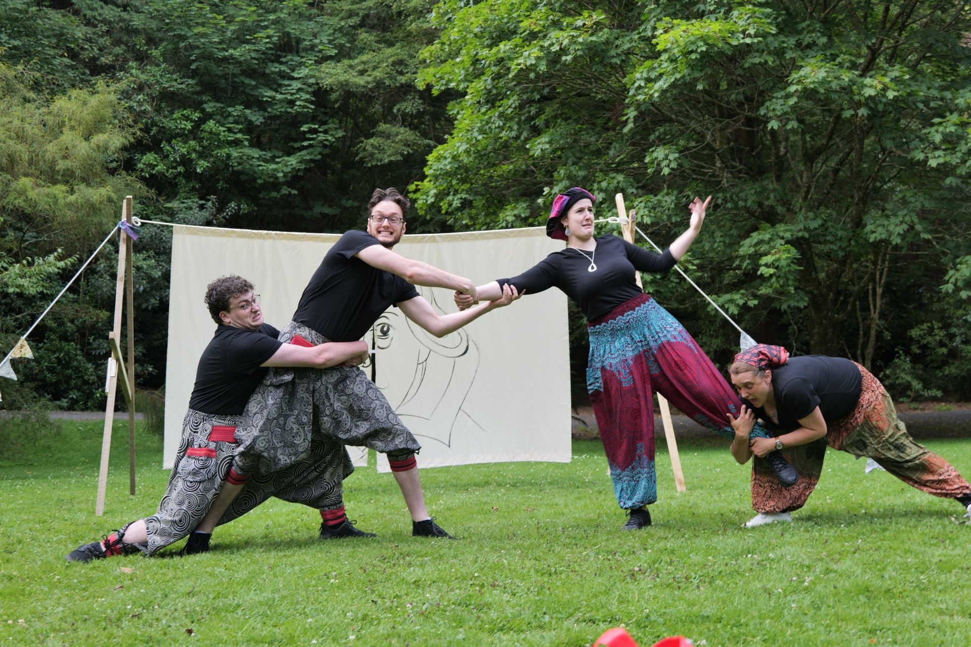 Slapstick aplenty ... Dunedin Summer Shakespeare cast members (from left) Jackson Rosie (Luciano)...