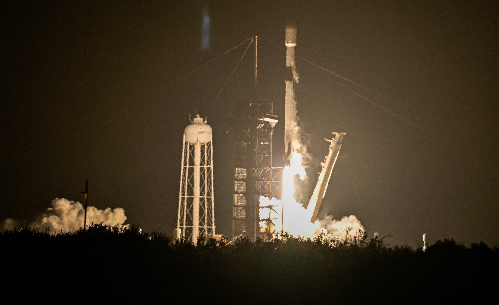 A SpaceX Falcon 9 rocket, carrying a machine named in honour of a former teacher at the...