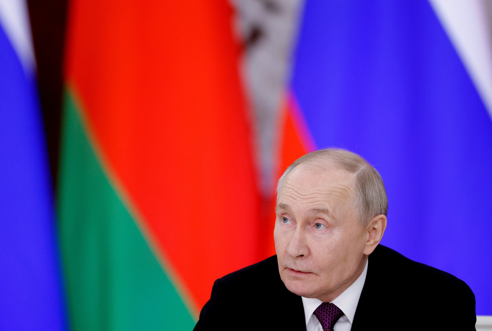 Russia's President Vladimir Putin attends a press conference following a meeting in Moscow with...