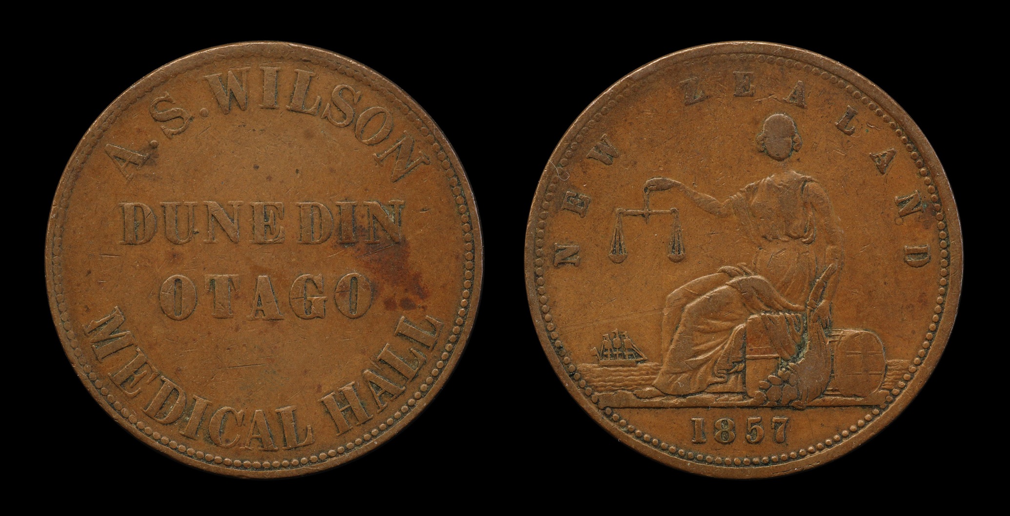 A rare 1857 penny token, issued by leading Dunedin chemist Andrew Smith Wilson.