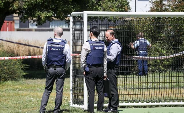 Police at the scene of the alleged attack in the Richmond Village Green on Stanmore Rd. Photo: RNZ