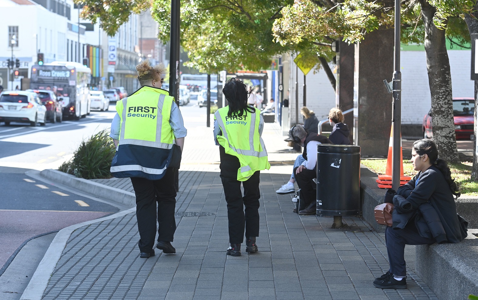 First security workers patrolling the bus hub after school yesterday. Photo: Linda Robertson