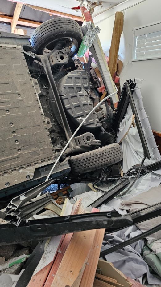 The car ploughed through the master bedroom wall.  PHOTO: DANIEL ALVEY
