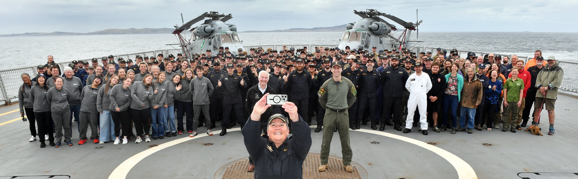 Cmdr Bronwyn Heslop takes a selfie with the ship’s company before HMNZS Canterbury berths at...