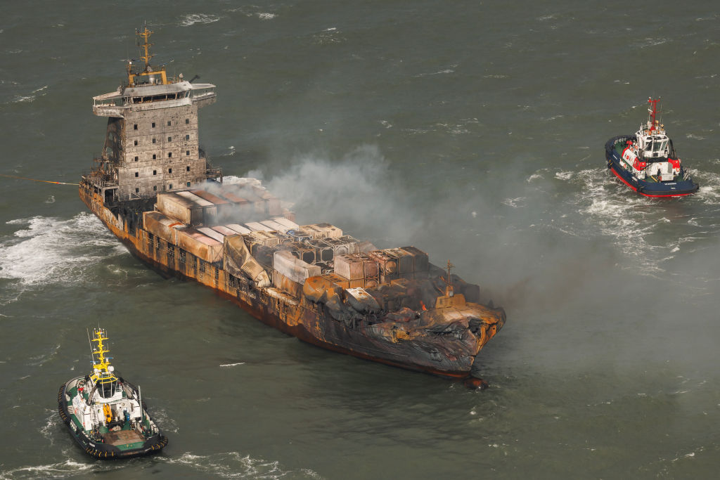 Smoke billows from the cargo ship Solong following the collision in the North Sea off the...