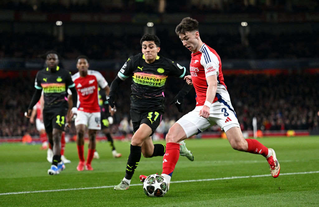 Kieran Tierney of Arsenal looks to cross the ball whilst under pressure from Richard Ledezma of...