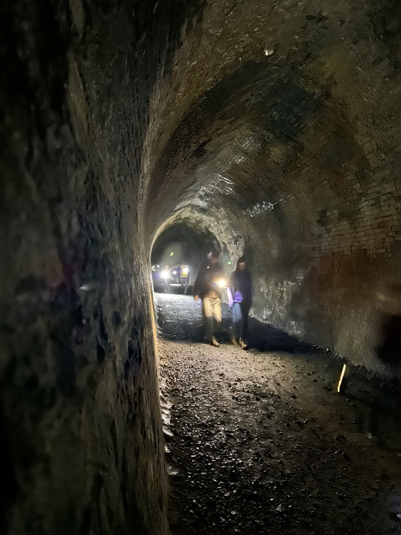 Visitors explore the Chain Hills tunnel, planned to be part of a cycle trail between Dunedin and...