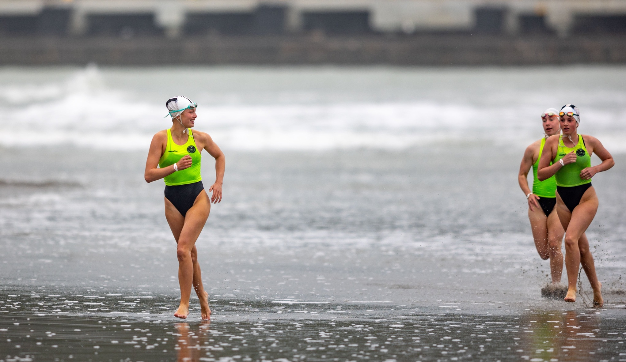 St Clair athlete Charlotte Aburn (left) leads team-mates Isabella Miller and Victoria Aburn as...