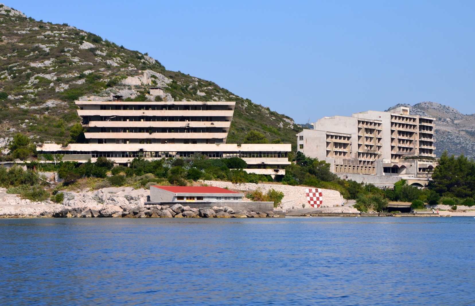 Hotel Pelegrin (left) and Hotel Kupari sit on the coast in Kupari, Croatia. They were abandoned...