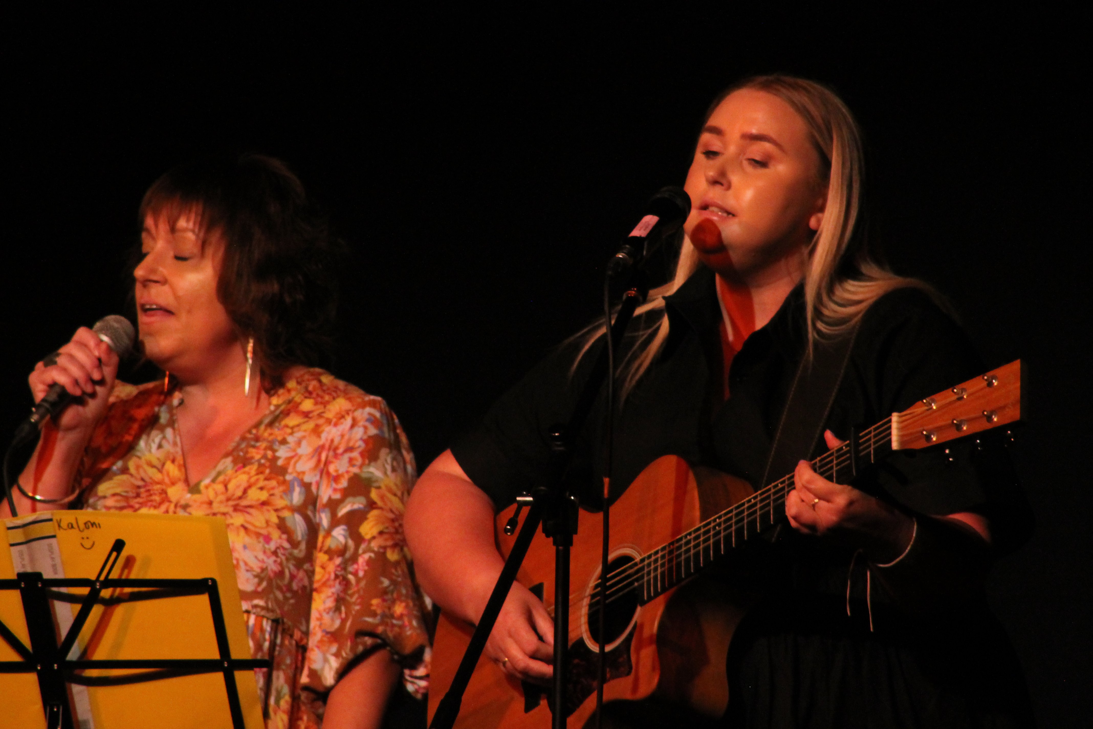 Jane Campbell (left) and Vanessa Harvey perform during a concert to raise funds for Christchurch...