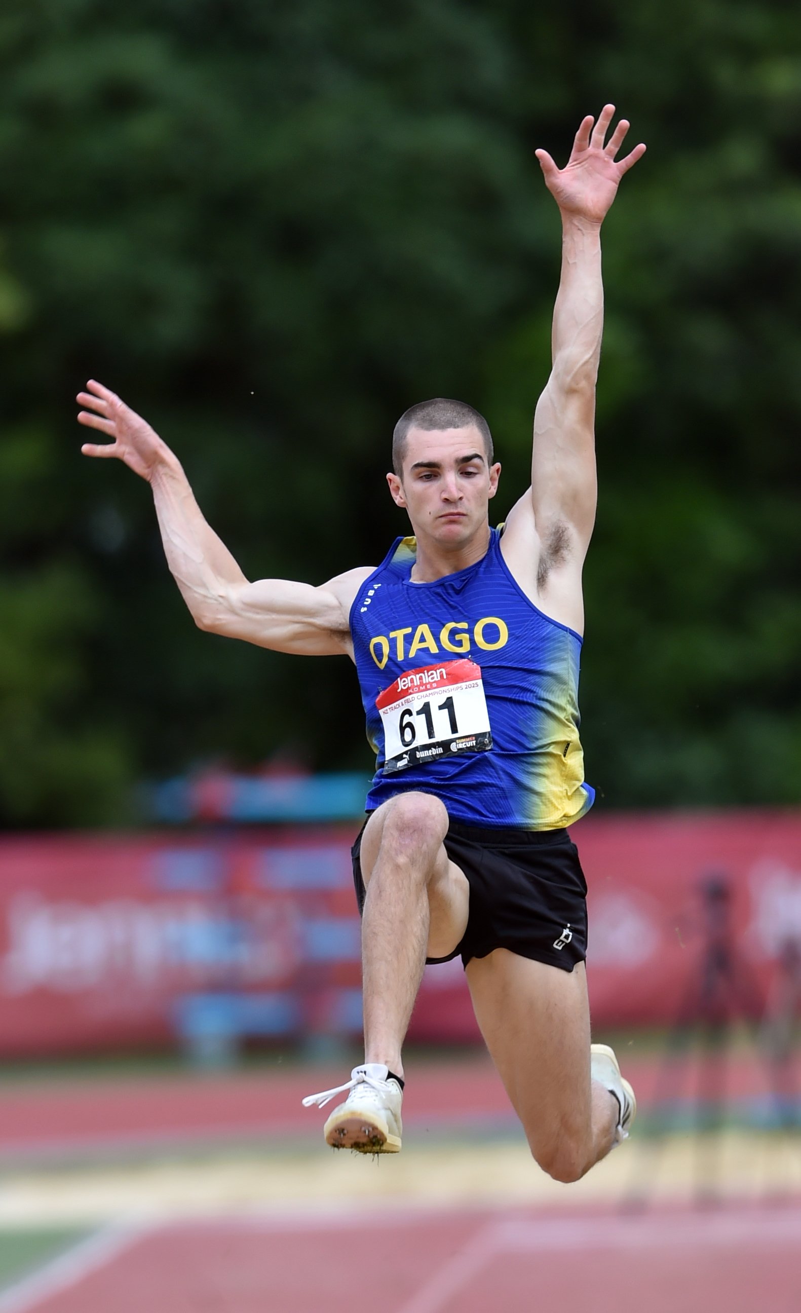 Shay Veitch on his way to winning the national men's long jump title. PHOTOS: PETER MCINTOSH