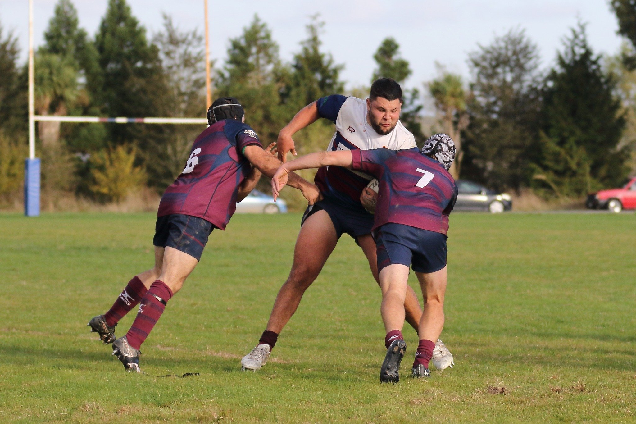 West Taieri enforcer Ethan Hippolite runs into some heavy contact from Clutha Valley defenders...