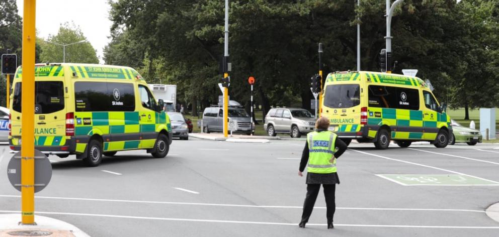 Ambulances leave the scene of the shooting. Photo: RNZ / Simon Rogers