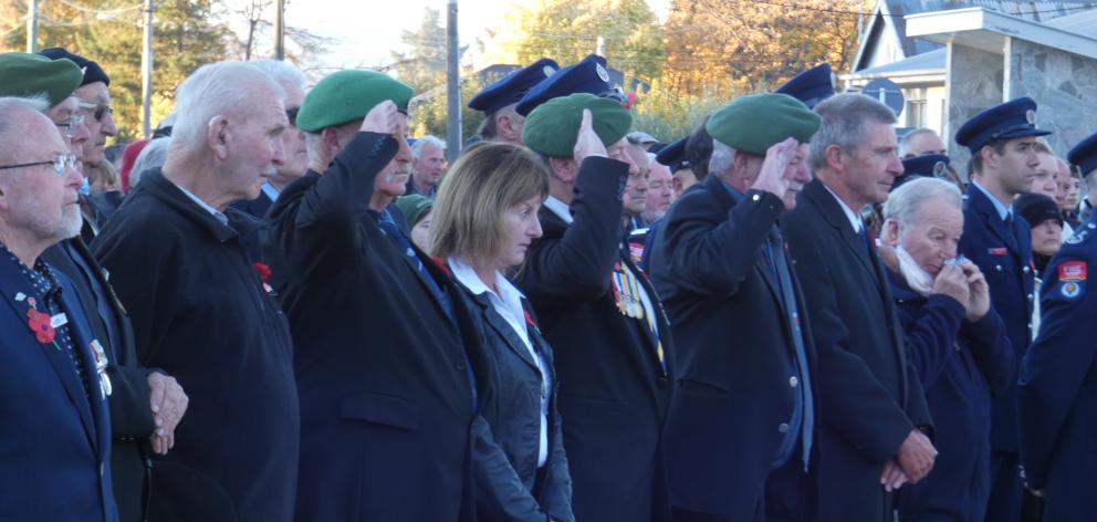 Veterans salute as The Ode is read at commemorations in Clyde.PHOTO: JARED MORGAN