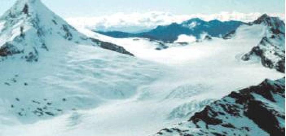 Mt Aspiring and across the Bonar Glacier towards Mt French (top right). Quarterdeck Pass leads of...