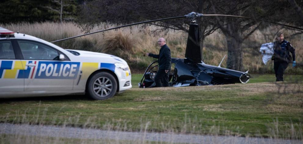 Police at the scene of the crash that injured four people including the bride and groom on their...