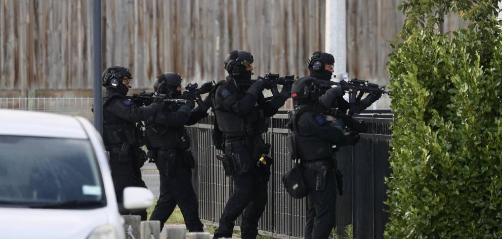 Police raid a property in Wigram. Photo: George Heard