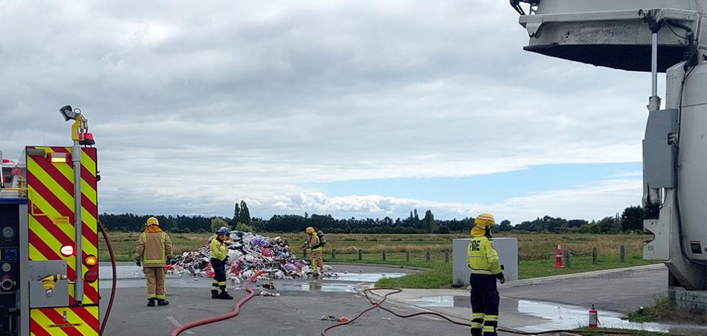 A fire crew extinguished the flames. Photo: Waimakariri District Council