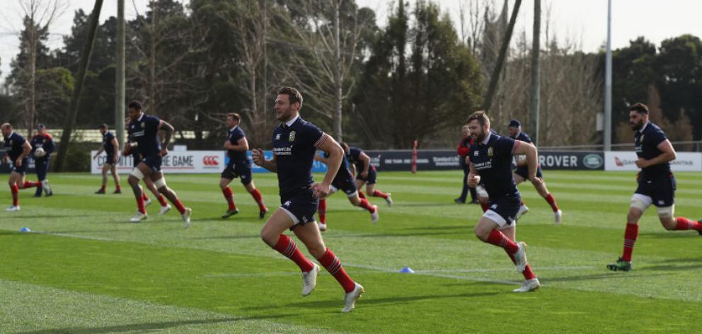 The Lions warm up during a training session in Hamilton. Photo: Getty Images 