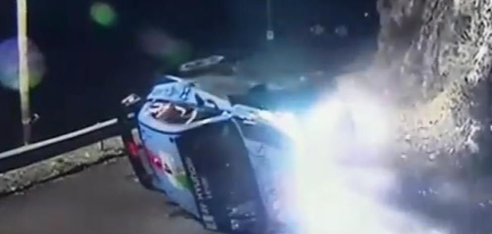 Hayden Paddon's car overturned and crashed into a bank on which a spectator was standing. Photo...