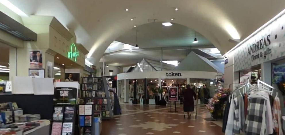 The mall has a Woolworths supermarket and 10 other tenants, including a pharmacy, bookstore and...