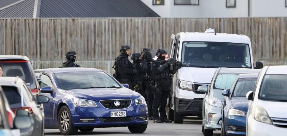 The Armed Offenders Squad helped execute the search warrants in Christchurch. Photo: George Heard...