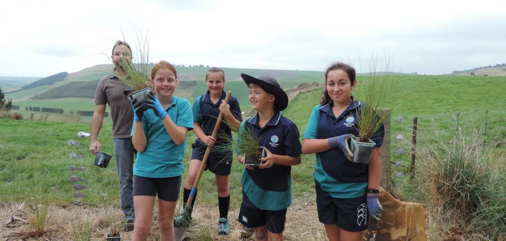 Getting ready to plant tussocks along the Alps 2 Ocean cycle trail through North Otago farmland...