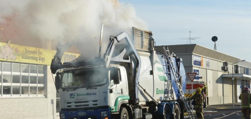 The rubbish was dampened down before the truck was escorted to a transfer station in Wickliffe St...