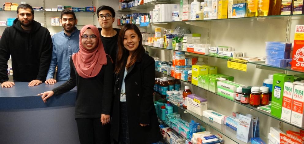 Final-year pharmacy students (from left) Harichandra Chhagan (24), Ali Adeeb (21), Fairuz Hashim ...