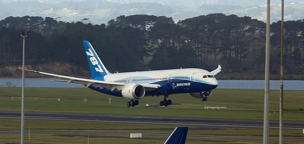 A plane lands at Auckland International Airport. Photo: ODT files