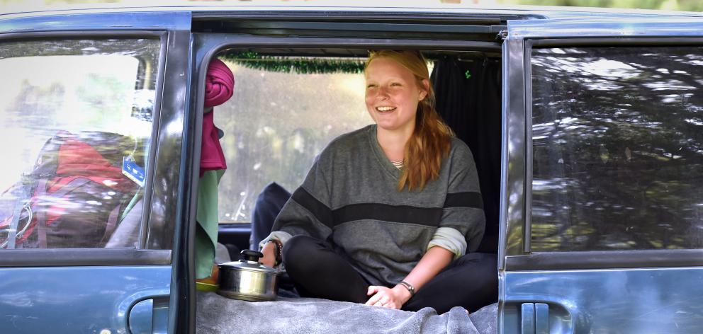 Svenja Kroell,  of Germany, relaxes in her van yesterday at the Waiora Scout Camp before the...