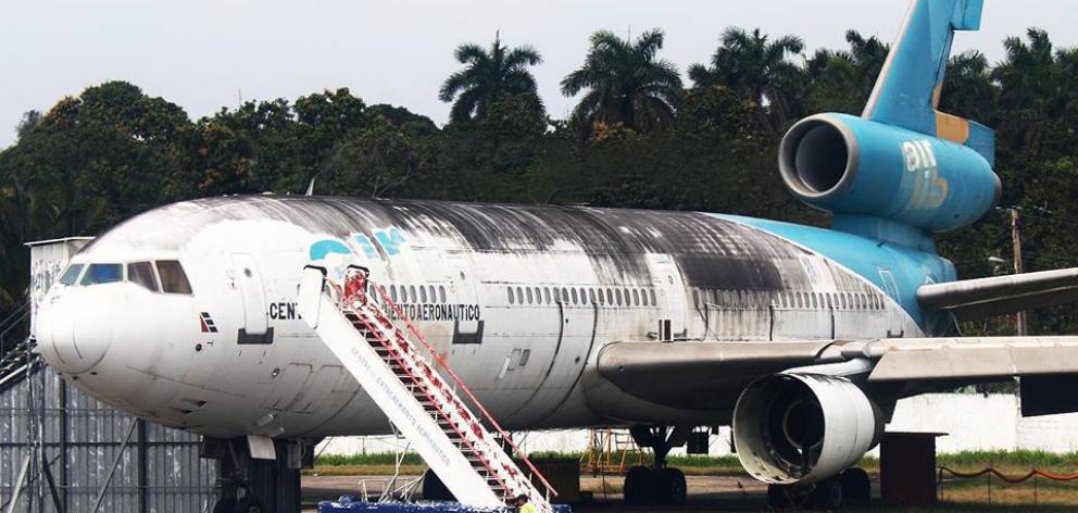 The former Air New Zealand DC10, parked at Havana Airport, Cuba, that a group of aviation...