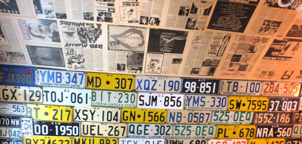 Most of these old licence plates were found in the garage.