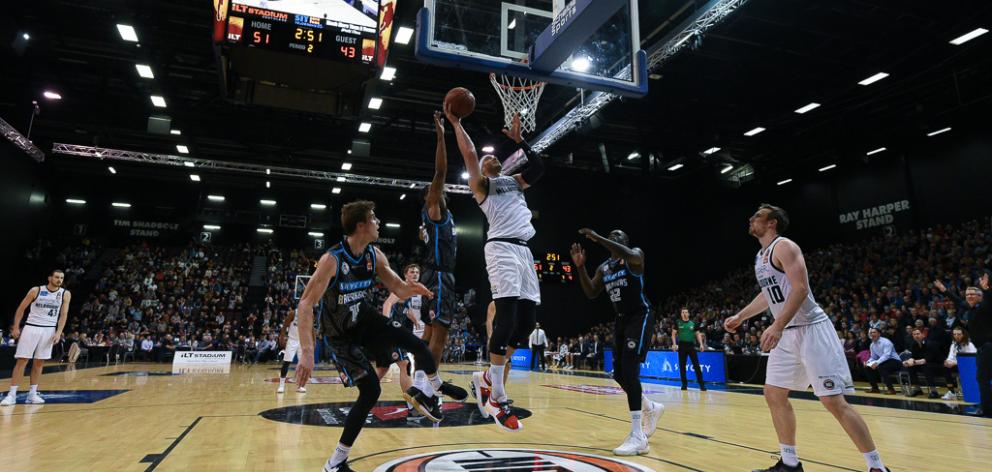 Melbourne United big man Josh Boone heads for the basket in the 108-101 Australian National...