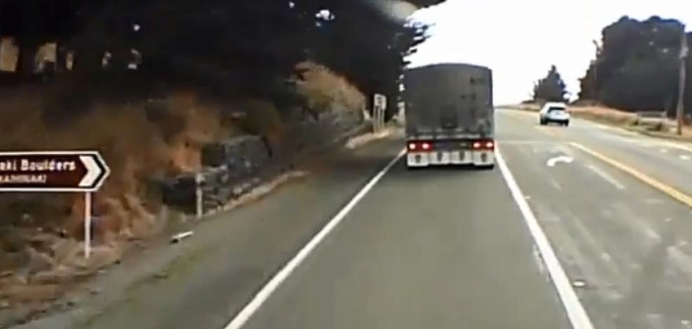 Dashcam footage of a vehicle turning out of the Moeraki Boulders turn-off in the wrong lane on...