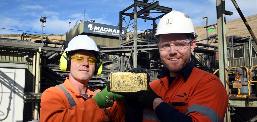 Gold Room services co-ordinator Rhys Davies (left) and Macraes general manager Matt Hine hold a...