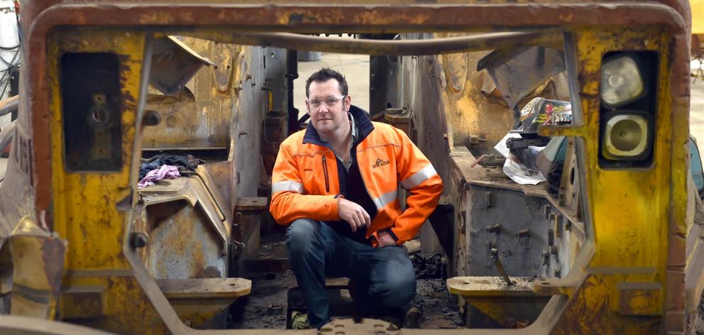 Site Weld founder Adrian Olsen in a Cat R1700 underground loader being refurbished for sale...