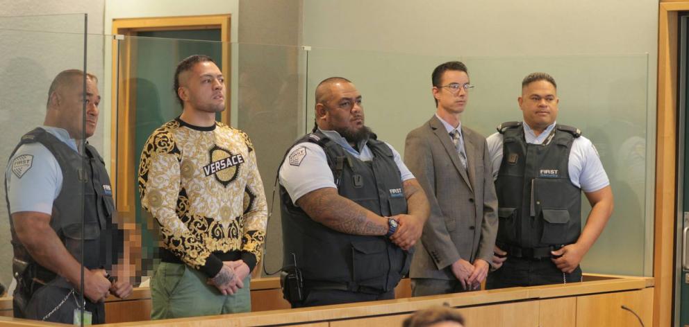 Senior Comanchero Tyson Daniels, left, and lawyer Andrew Simpson stand in the dock together....