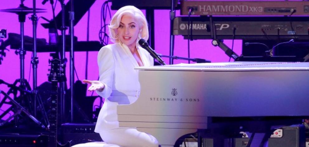 Gaga made her name almost 10 years ago with catchy pop songs, arresting dance routines and outrageous stunts like setting her piano on fire and wearing a raw meat dress. Photo: Reuters