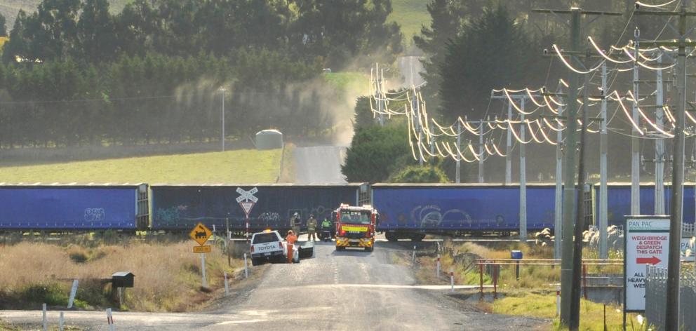 A truck and train crashed on State Highway 1 near Milton today. Photo: Christine O'Connor