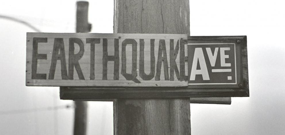 An altered street sign from about the time of the earthquake. PHOTOS: ODT FILES