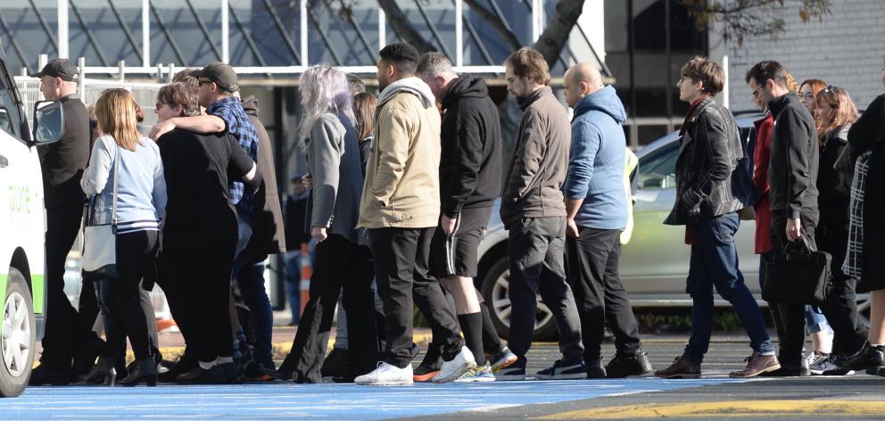 Staff attend a blessing at the central Dunedin Countdown today. Photo: Gerard O'Brien